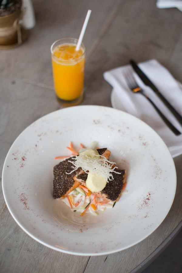 Hotel Las Americas Golden Tower Panama Экстерьер фото A plate of salmon with a glass of orange juice